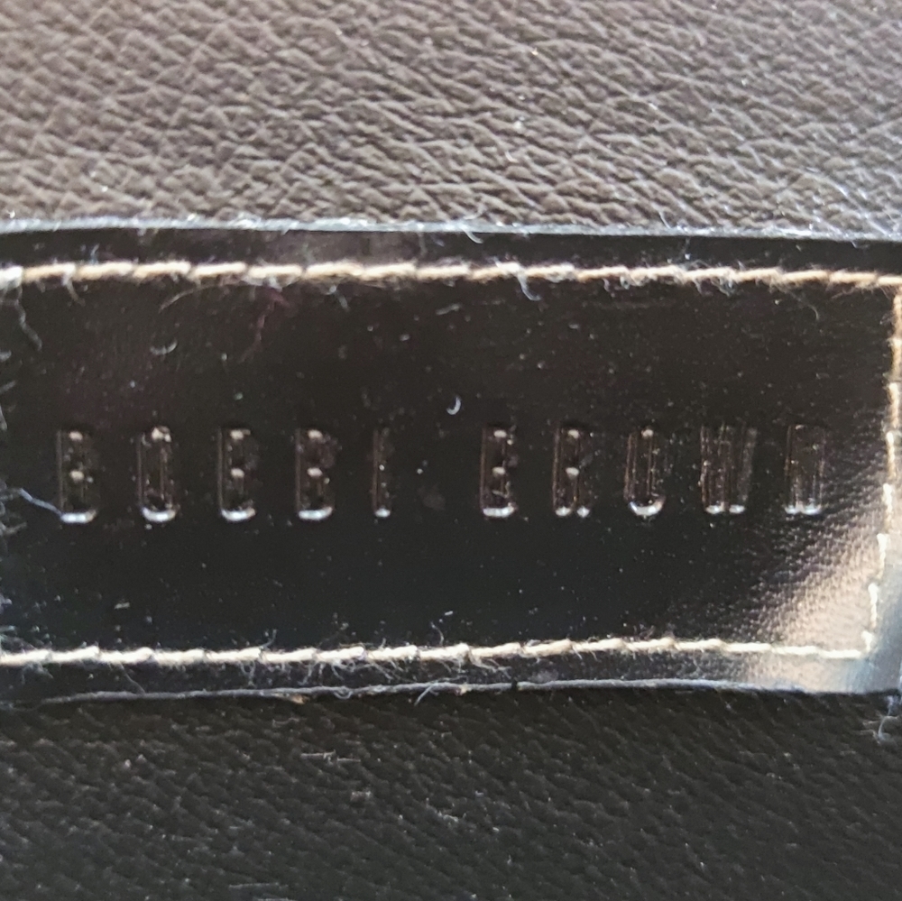 Bobbi brown leather traveling makeup organizer.